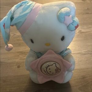 Hello Kitty Plush Toy with Star light, batteries not included. Like new!